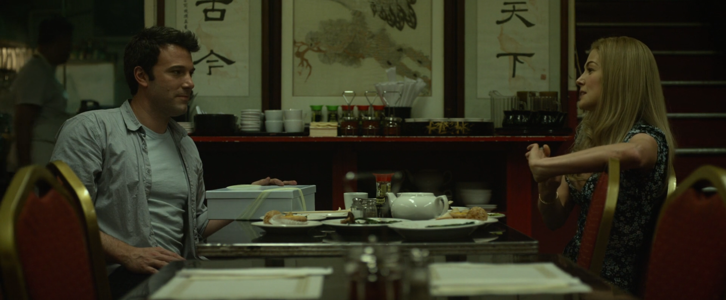 Nick et Amy au restaurant